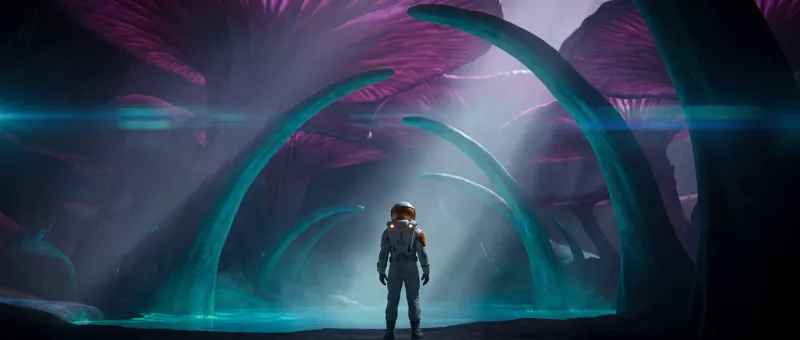 The explorer stands small under arching turquoise-lit roots beneath vast magenta canopies, light falling through the mist.