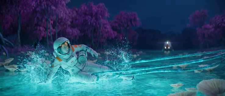The astronaut falling sideways into the water in a burst of spray, the tendrils stretched into straight lines running to the horizon